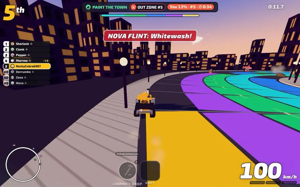A kart drives beside a street painted in yellow, purple, green and blue lanes